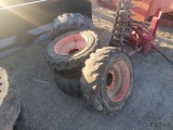 (4) Solid Bobcat Wheels and Tires