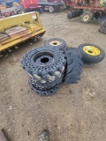 (4) Solid Skidsteer Wheels and Tires