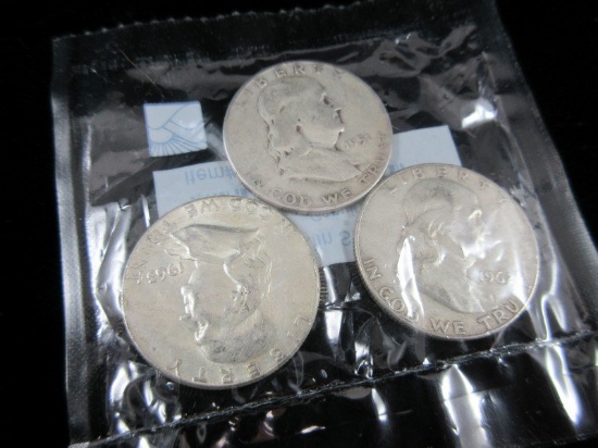 Three Silver Half Dollars as Shown