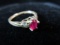 10k Yellow Gold Red Center White Accent Side Stone Ring