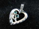 Sterling Silver Heart Themed Pendant with Green Stones