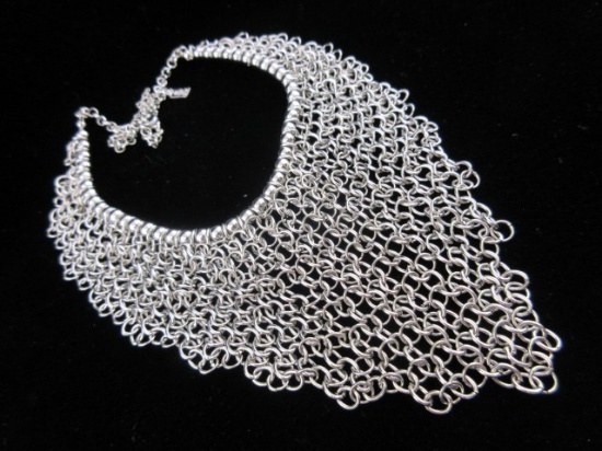 Signature silver tone mess front necklace
