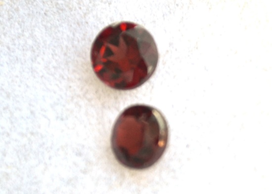 1.28 Carat Matched Pair of Nice Garnet Rounds