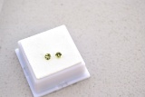 0.59 Carat Matched Pair of Peridot Rounds