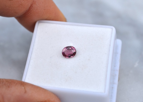 0.68 Carat Oval Cut Vibrant Pink Garnet