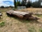 TANDEM AXLE - 20 FOOT FLATBED TRAILER AND CONTENTS