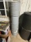 STACK OF PLASTIC BUCKETS WITH LIDS