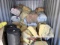 CONTENTS OF THE CONTAINER - (4) ROLLS OF FELT - R25 INSULATION - (3) METAL CABINETS