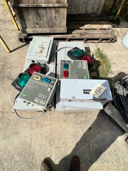 PALLET OF ELECTRICAL BOXES WITH RED AND GREEN LIGHTS