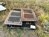 PALLET WITH TWO CAST IRON STORM DRAIN COVERS