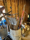 METAL DRUM OF YARD TOOLS AND PLASTIC CAN OF YARD TOOLS