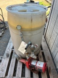 PALLET WITH A DRUM OF DEF AND RED LION CONVERTIBLE JET PUMP