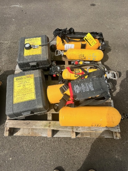 Pallet with miscellaneous oxygen tanks, gas, masks