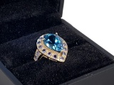 10kt yellow gold ring 6.50 CTW 5.50 blue topaz and 1.00 ct tanzanite