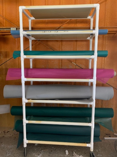 Tall PVC Cart with Rolls of Fabric