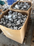 Pallet with Boxes of White PVC Couplings