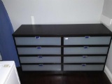 Modern wooden dresser with glass drawers
