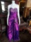 Beautiful shiny purple prom dress with appliques on bust, leg and backBrand: -Size: LPrice: $300