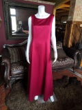 Beautiful plain red prom dress with buttons on the backBrand: MichaelangeloSize: 14Price: $150