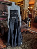Incredible black dress with applications on the bust.Brand: Mike BenetSize: MPrice: $250
