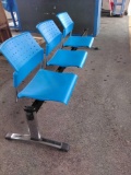 Blue Chairs on Black Stand