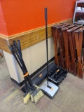 Group of Brooms, Group of Foldable Tray Stands, & Plastic Bins