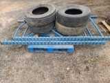 (4) Tires, (2) Blue Rack Stands