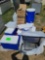 (3) Boxes-Stackable container Stand with Wicker basket, (4) Ice chests, (1) Coleman 5 Gal Cooler,..