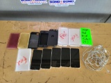 (5) iPods, (5) iPod Cases, Group of Charging Wires, (4) Holding Cases