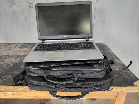 (2) HP Laptops with black cases