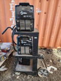 (2) Miller XMT 350 CC/CV Welders, (1) Lincoln Welder, Rolling Equipment Cart