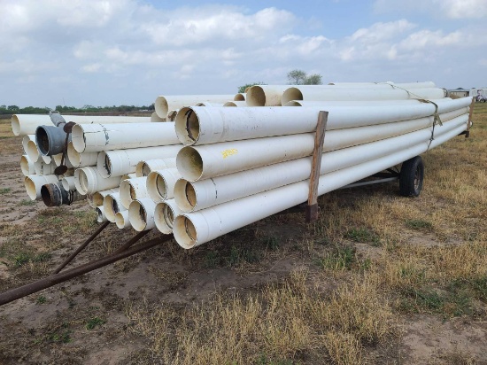 Group of PVC Irrigation Pipes on Trailer