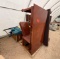 (1) Wooden Commercial Office Desk, (1) Dry-Erase Board Stand, (1) Brown Sofa, (1) Teal Cushion, Plus