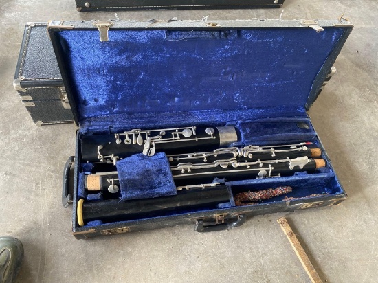 (1) Bass Clarinet w/ Carry Case, (1) Bassoon w/ Carry Case