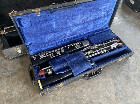 (1) Bass Clarinet w/ Carry Case, (1) Bassoon w/ Carry Case