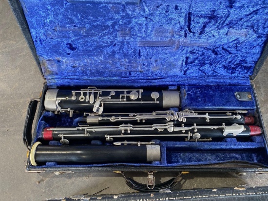 (1) Bass Clarinet w/ Carry Case, (1) Bassoon w/ Carry Case
