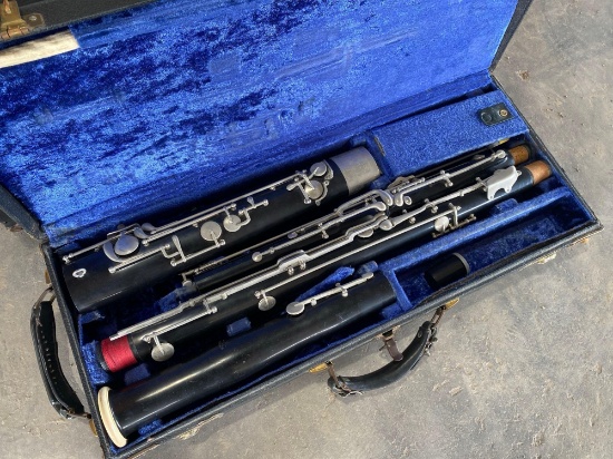 (1) Bass Clarinet w/ Carry Case, (1) Bassoon w/ Carry Case
