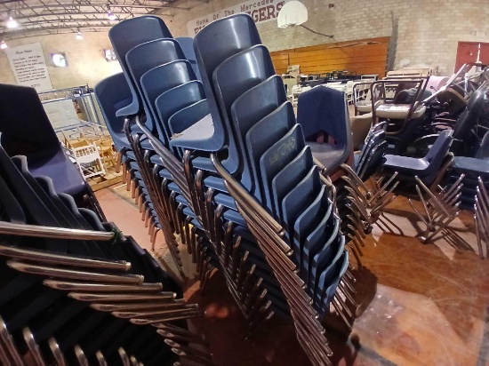 Group of Blue Plastic Student Stackable Chairs