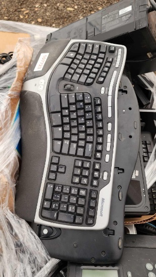 (1) Pallet w/ Kronos Office Phones, Computer Keyboards, Power Surge Outlets, etc.