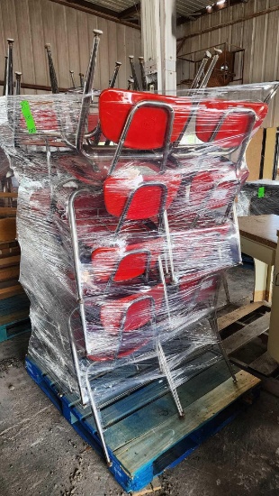 Group of Metal Red Student Desk Chairson Pallet