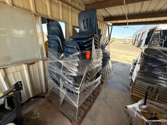 Group of Navy Stackable Desk Chairs on Pallet