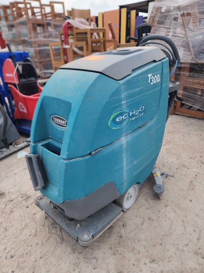 (1) Tennant T300 Walk Behind Floor Scrubber