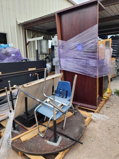 (2) Pallets w/ Round Table, Student Desk, (2) Blue Student Chairs, (1) Office Desk, etc.
