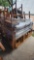Group of Wooden Chairs on Pallet