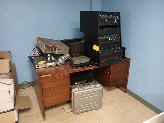 Group of Assorted Power Conditioners, Wood Desk, (1) Hardcover Briefcase, Misc. Items. OFFSITE: