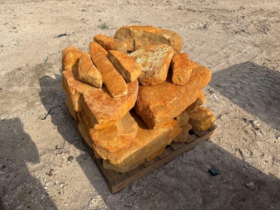 Group of Orange Stone Boulders on Pallet