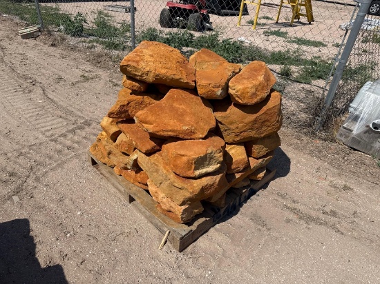 Group of Orange Stone Boulders on Pallet