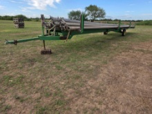 Group of Irrigation Pipes on Utility Trailer