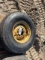 NEW 9.5L - 14SL TIRE AND RIM