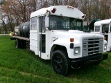 1986 IH S1800 BUS, DSL ENG, AUTO TRANS, AIR BRAKES, 22’ STEEL BED, SELLS WITH 1600 POLY TANK, PUMP A
